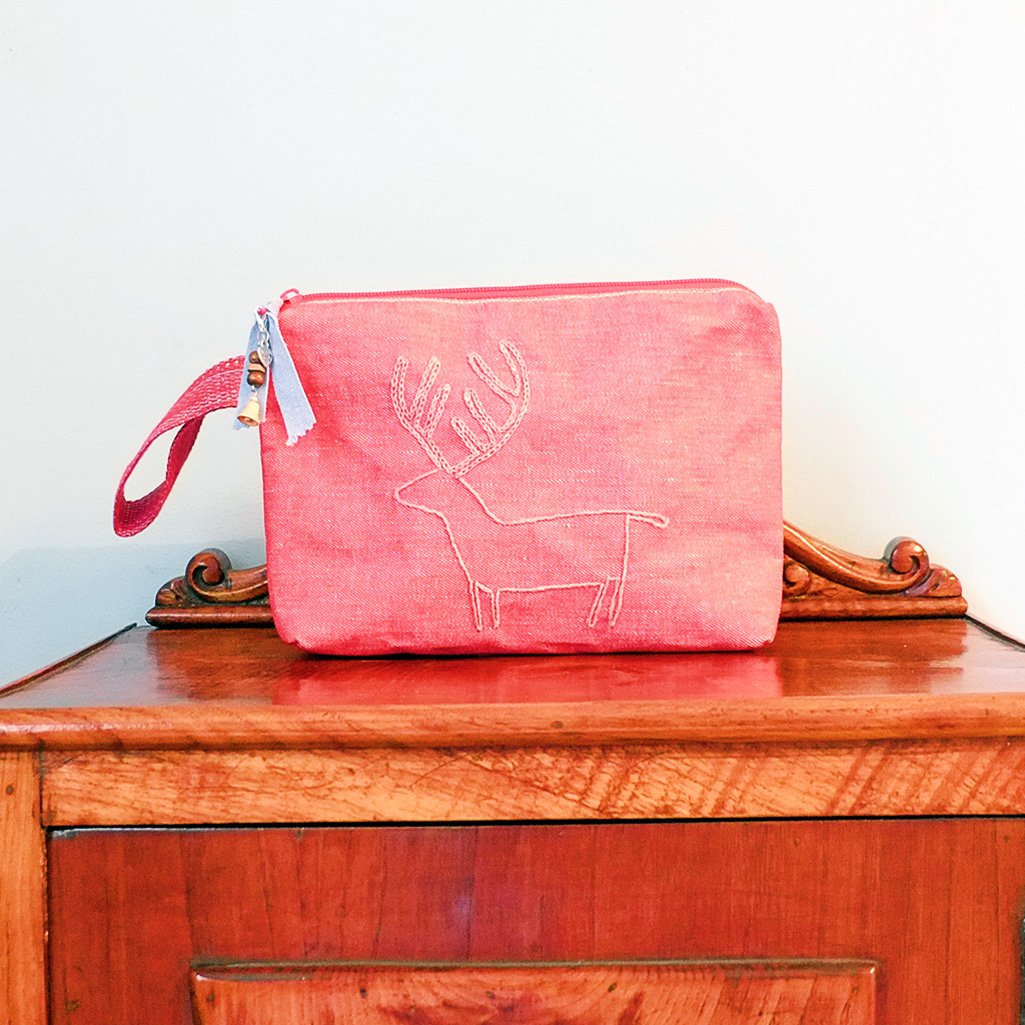 Neceser rojo con ciervo